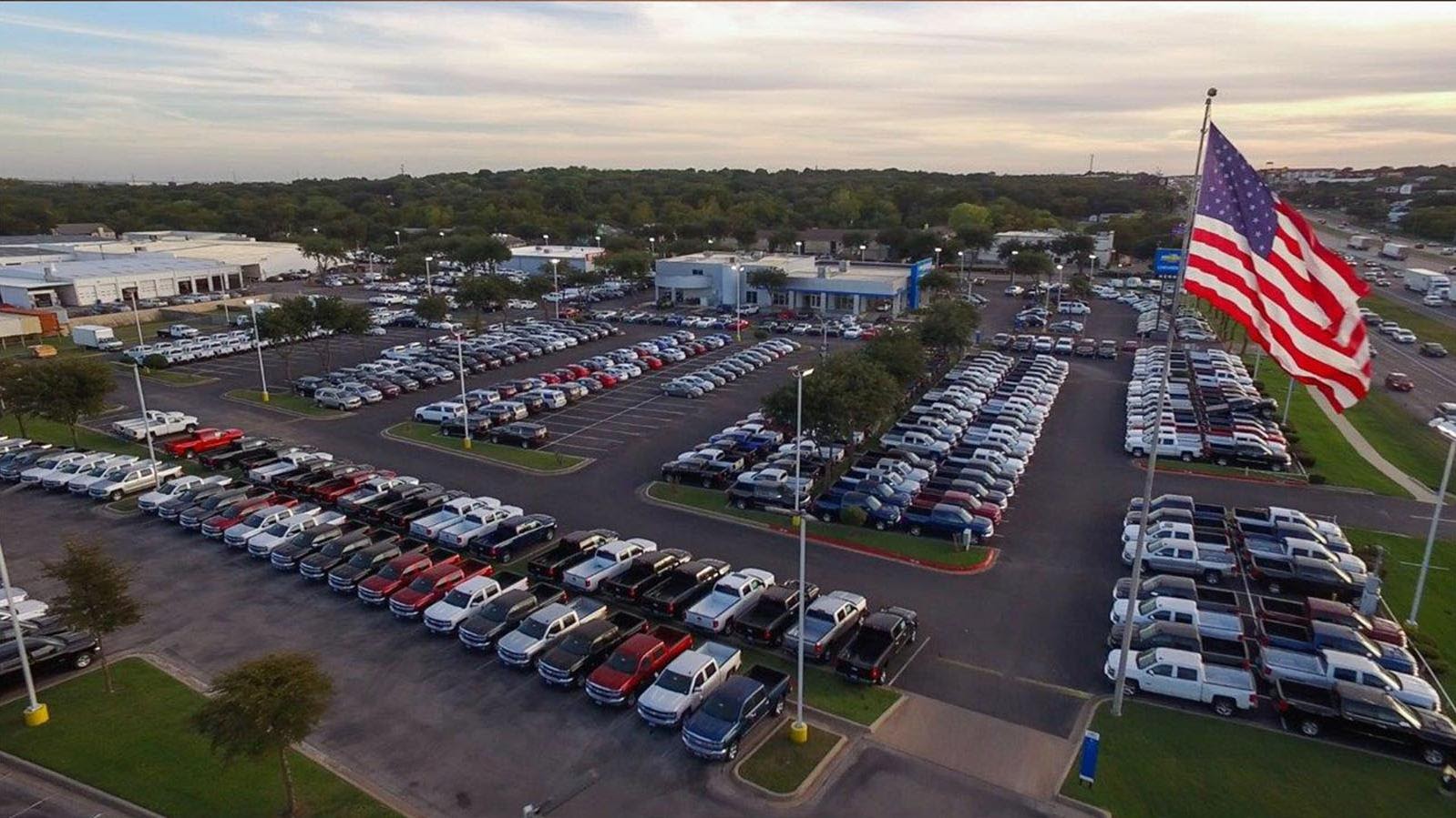 Photo of used car dealership lot in Austin, TX
