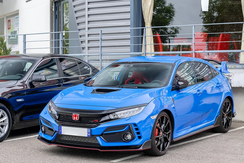 Blue Honda Civic in a parking lot