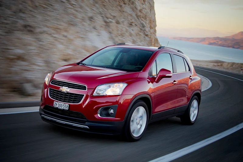 Red Chevy Trax driving in the desert