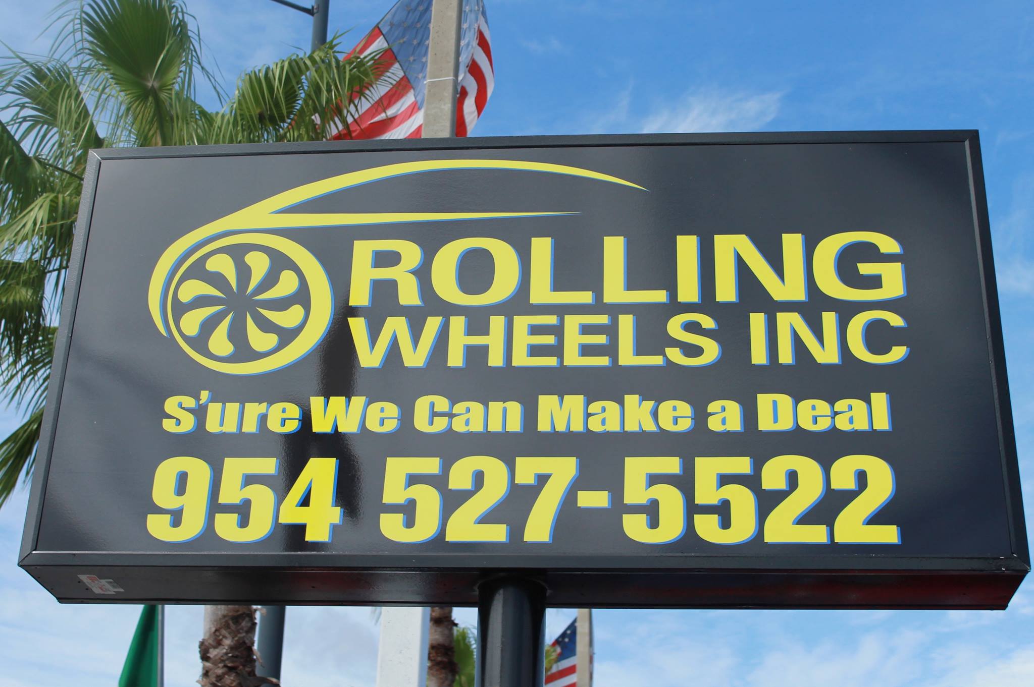 Photo of Rolling Wheels Inc sign