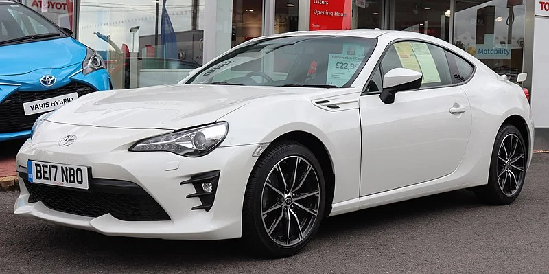 White Toyota 86 in a parking lot