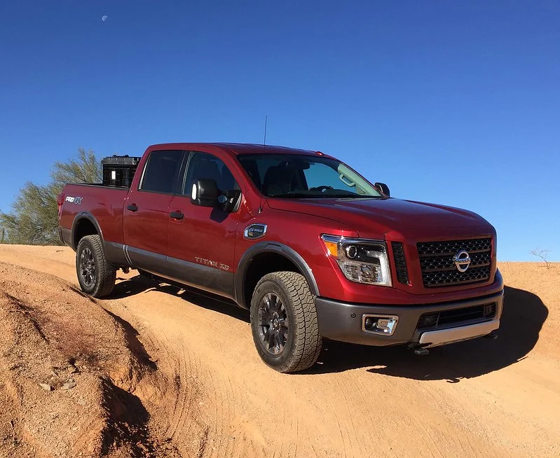 Red Nissan Titan XD in the desert