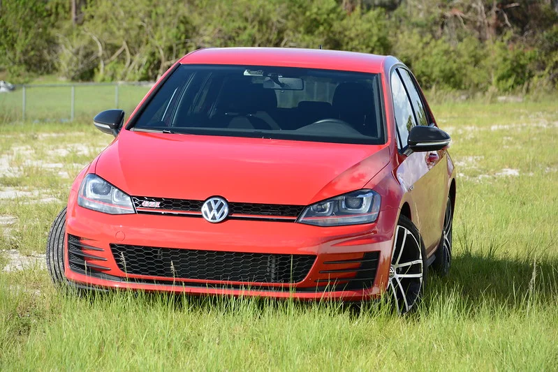 Volkswagen Golf parked in a field