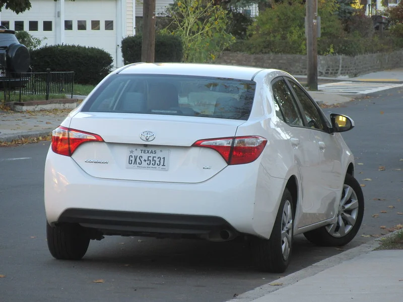 White Toyota Corolla on a street