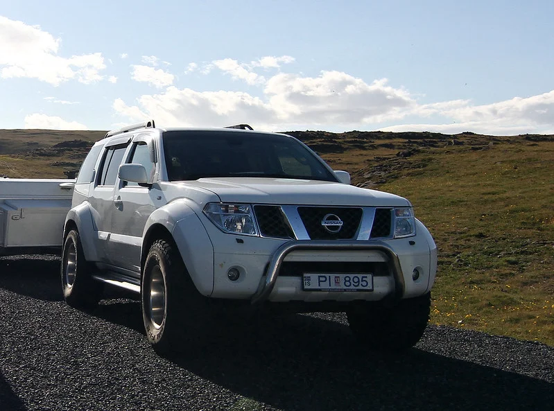 Nissan Pathfinder driving on a road