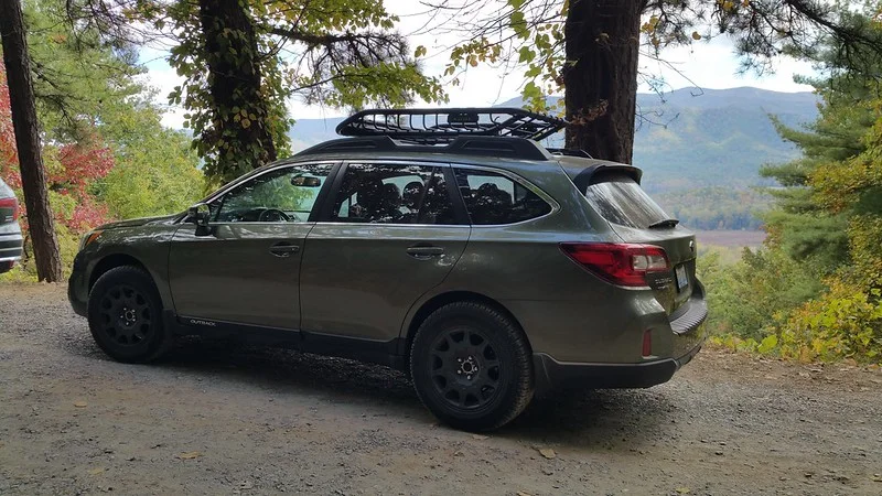 Subaru Outback parked in the wilderness