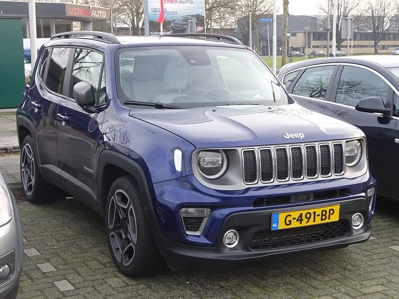 Blue Jeep Renegade in a parking lot