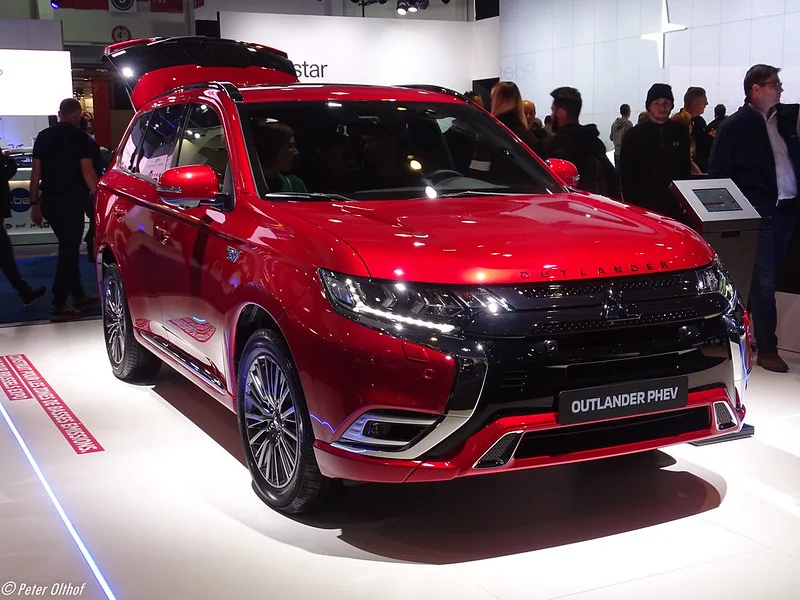 Red 2020 Mitsubishi Outlander in a showroom