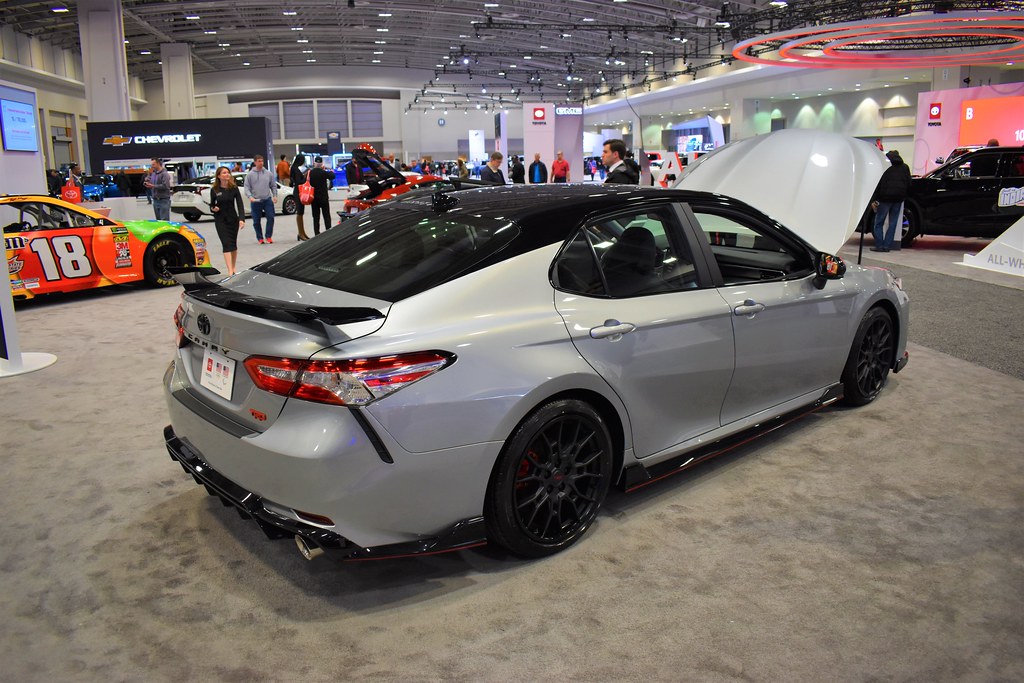 Silver Toyota Camry in a showroom