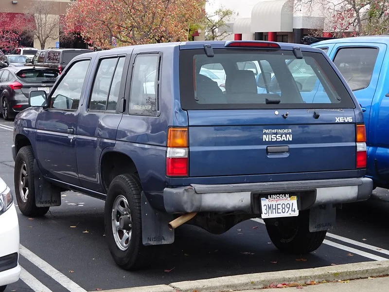 Rear view of a Nissan Pathfinder in a parking lot