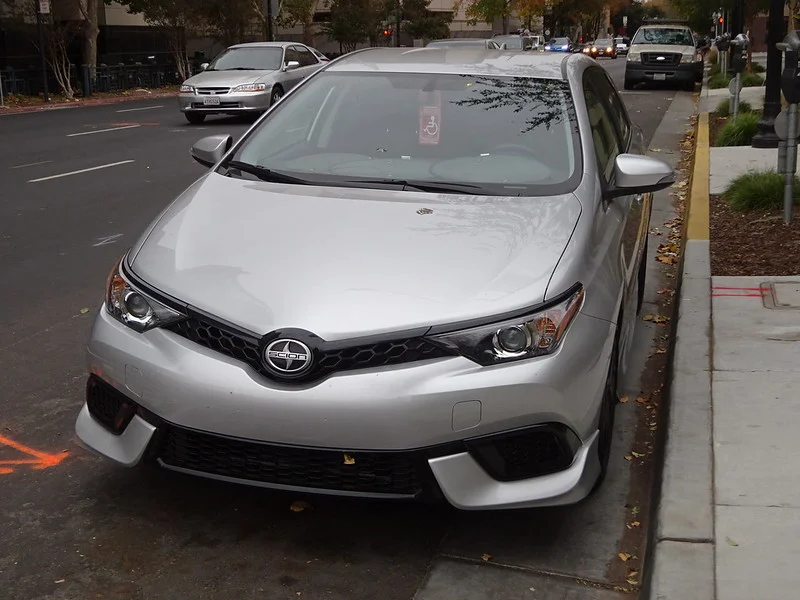 Silver Scion iM parked outside