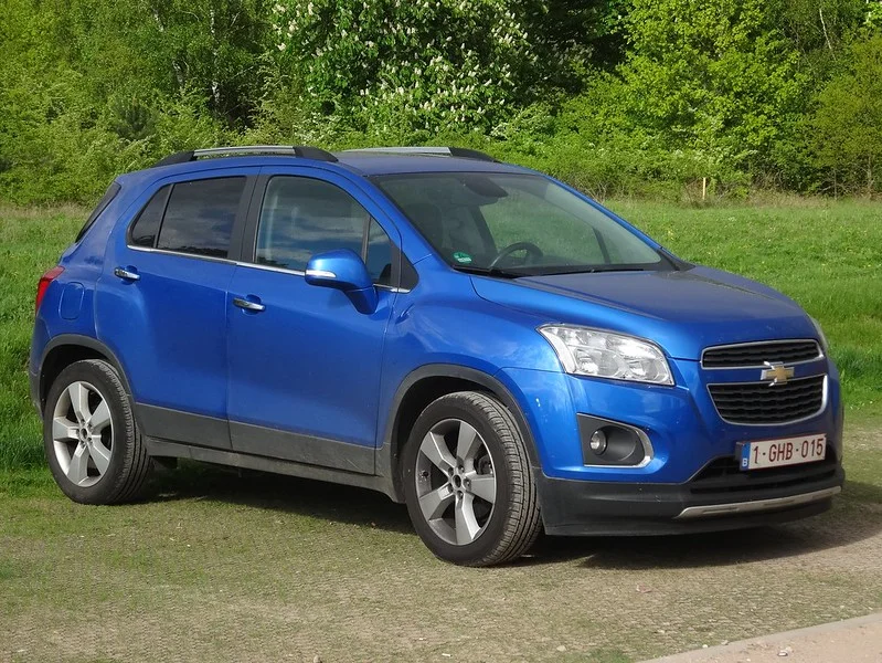 Blue 2020 Chevy Trax parked in a field