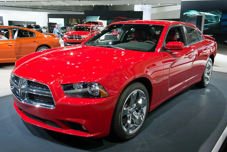 Red Dodge Charger in a showroom