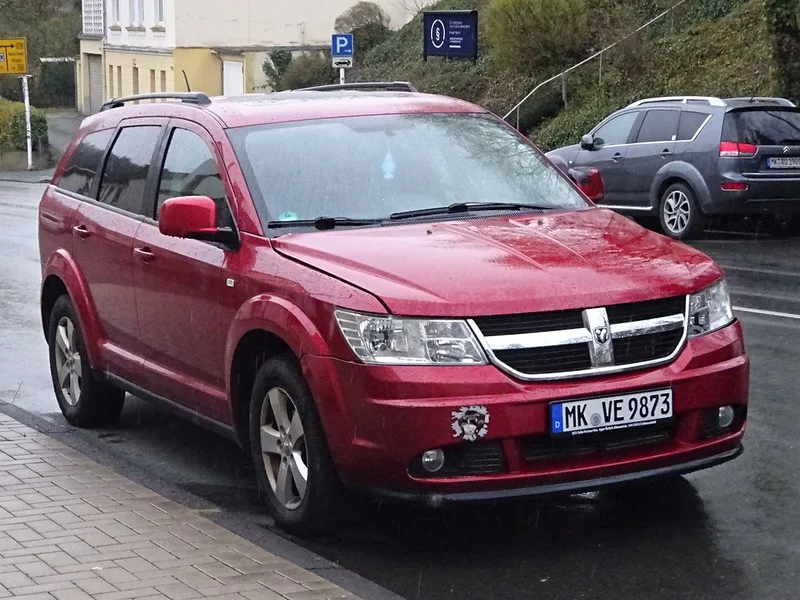 Red Dodge Journey on a street