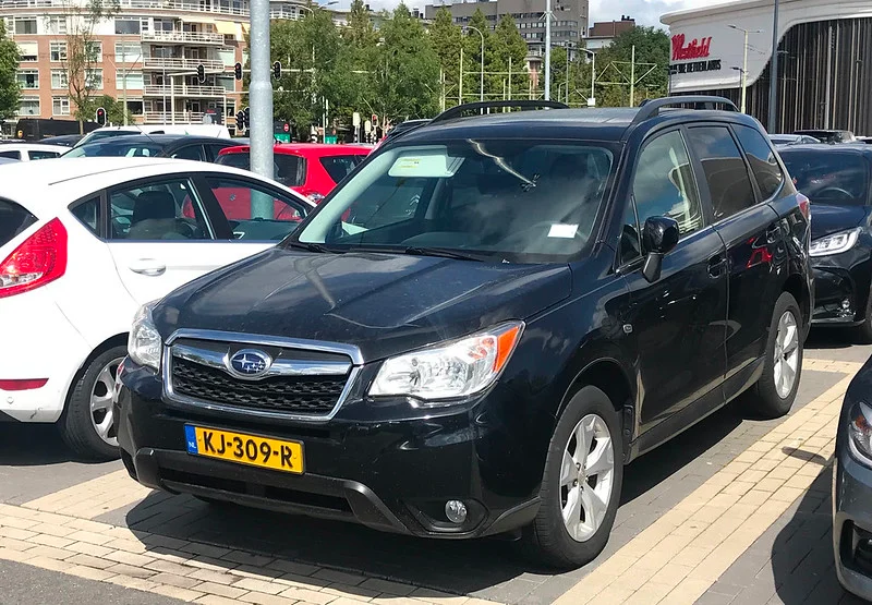 Black 2016 Subaru Forester in a car lot