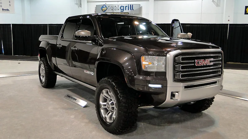 Black GMC Terrain in a showroom