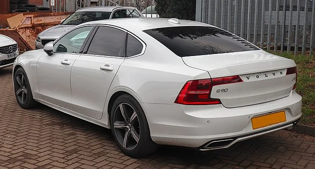 Rear view of a white Volvo S90