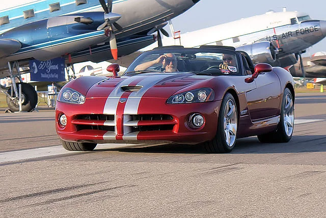 Red Dodge Viper with a racing stripe