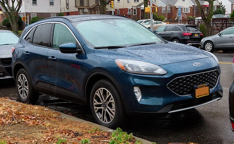 Ford Escape parked on a wet street