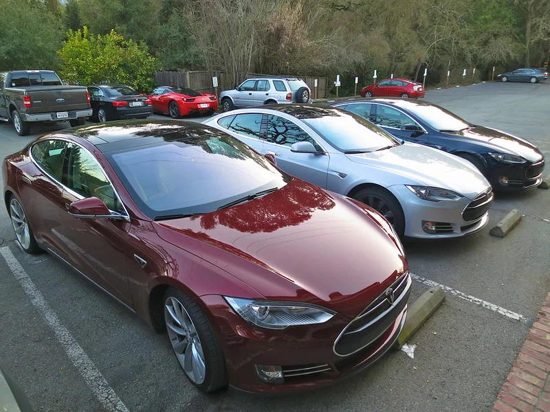 Red Tesla Model Y in a lot