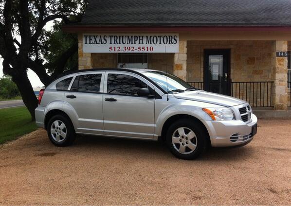 Photo of used car in front of Texas Triumph Motors