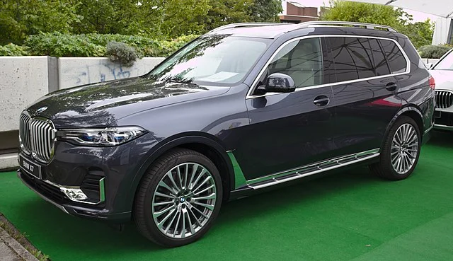 BMW X7 on a green surface