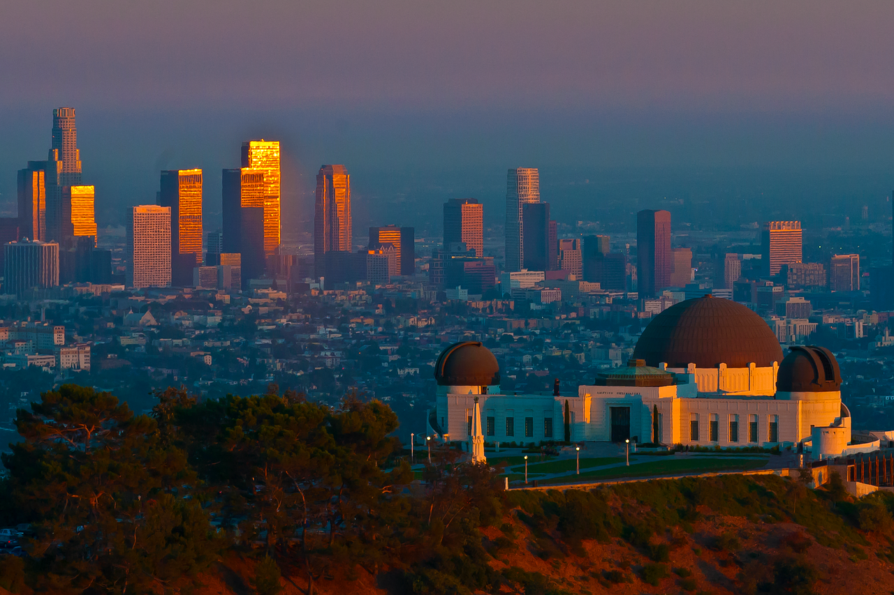 photo of griffith observatory against los angeles skyline