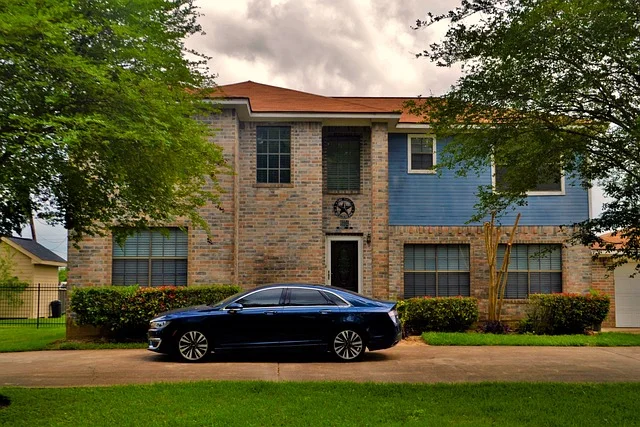 Lincoln MKZ parked in front of a house