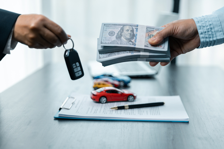 Buying a car; exchange of cash for car keys