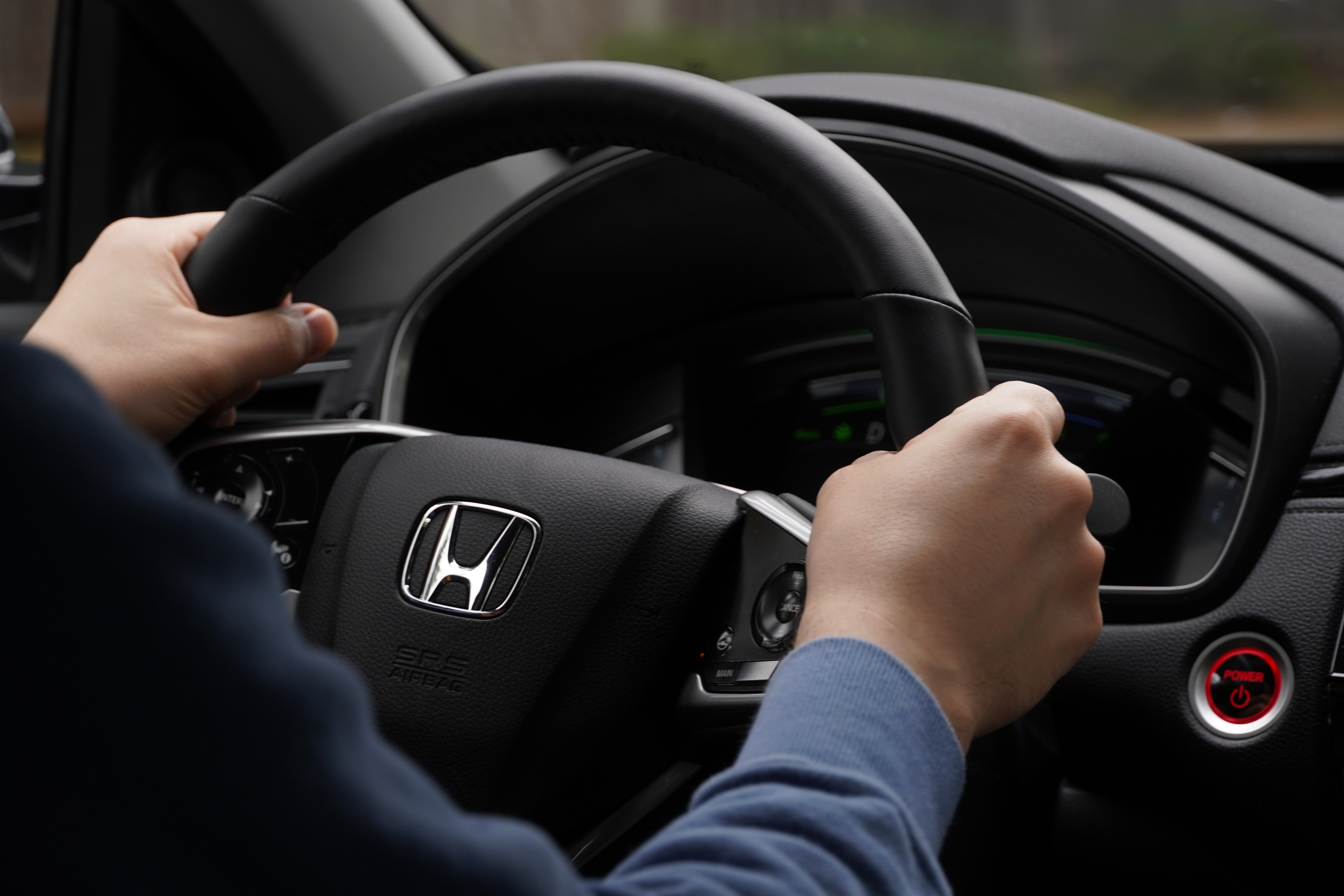 Honda logo on a steering wheel