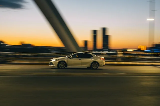 Toyota Camry driving across a bridge