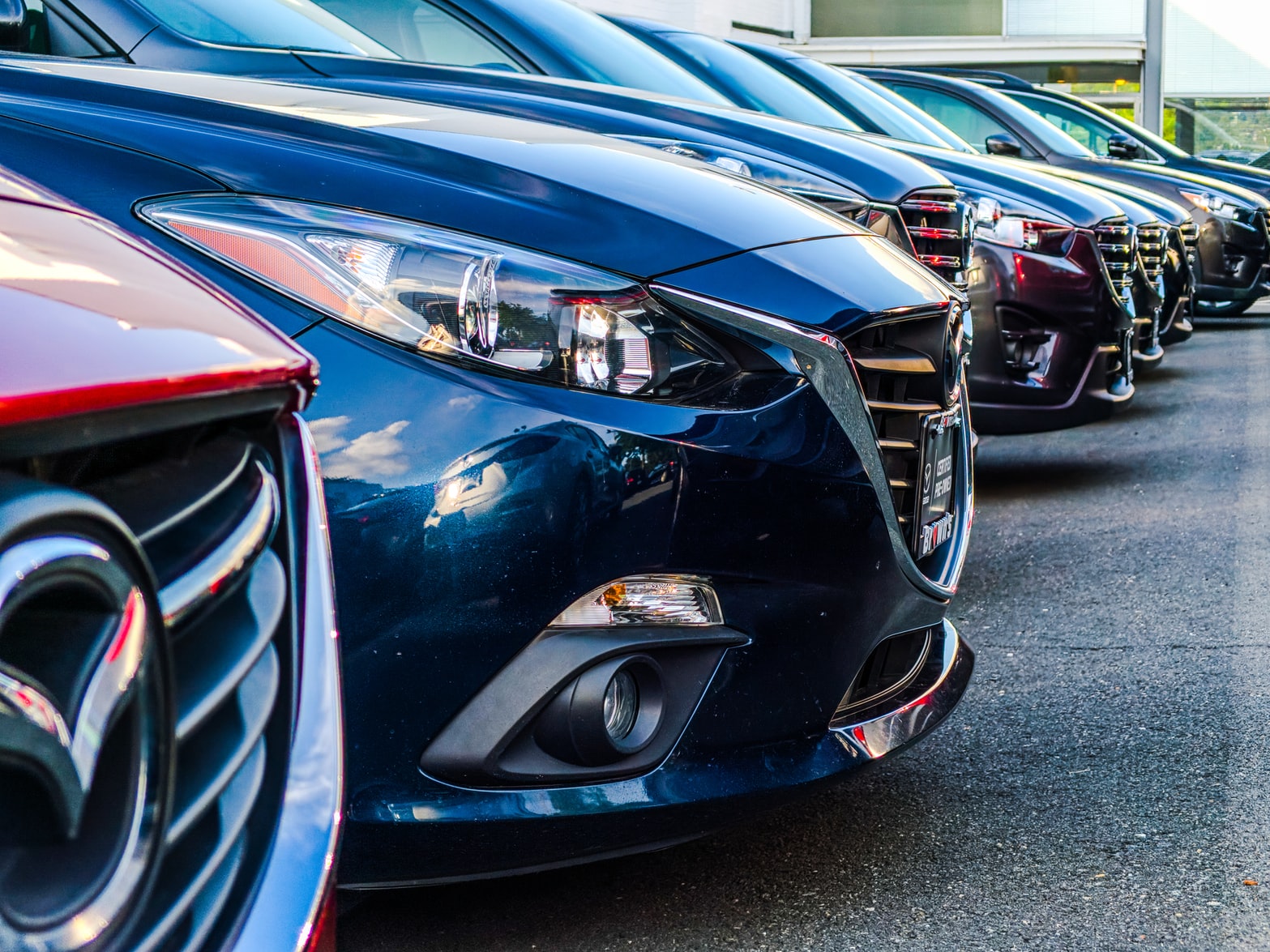 Photo of used cars in a line