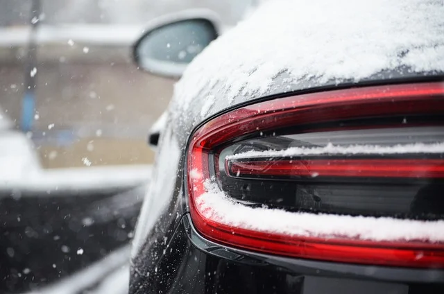 Porsche Macan with snow on the bumper
