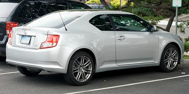 Silver Scion tC in a parking lot