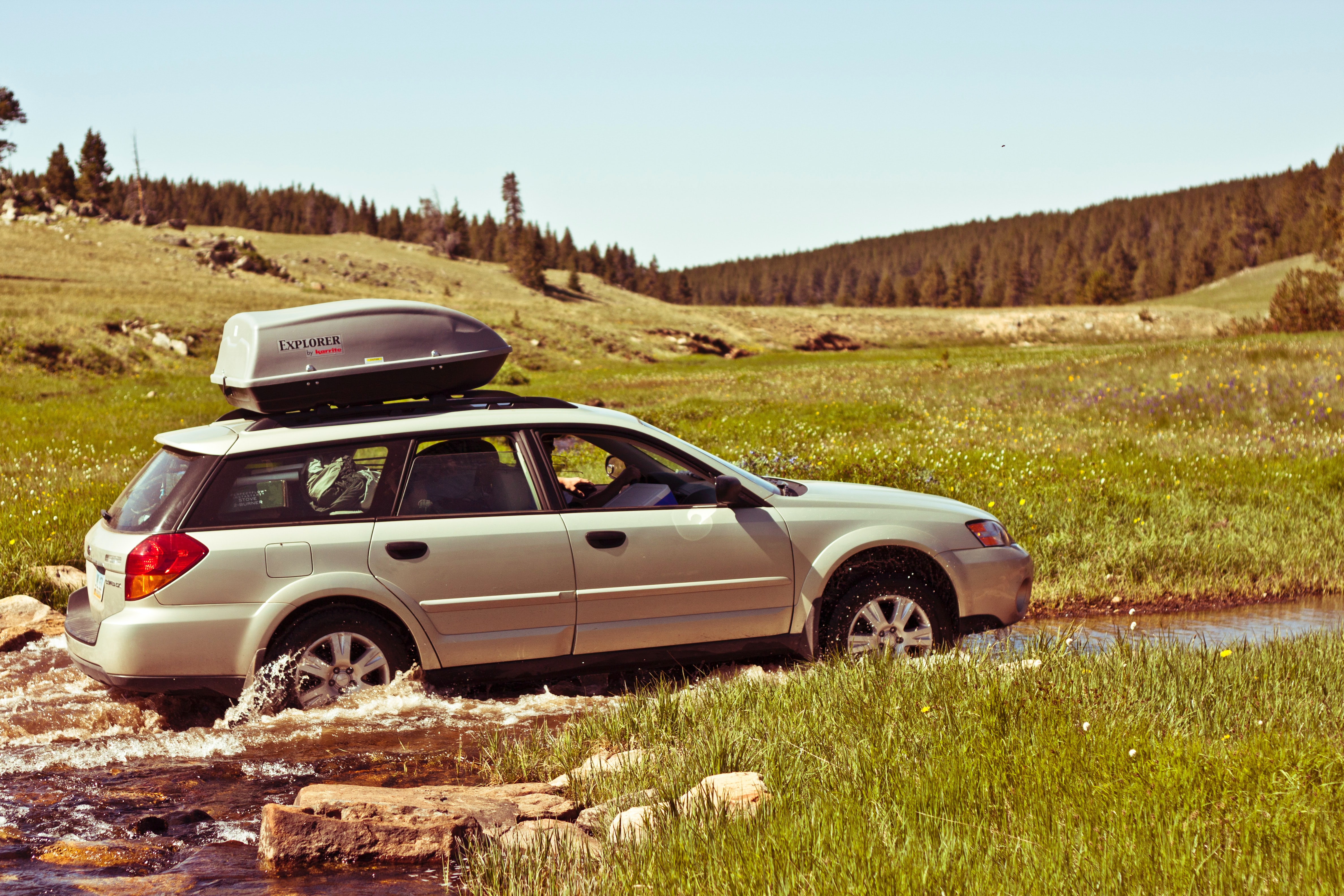 Photo of Subaru Outback trekking offroad