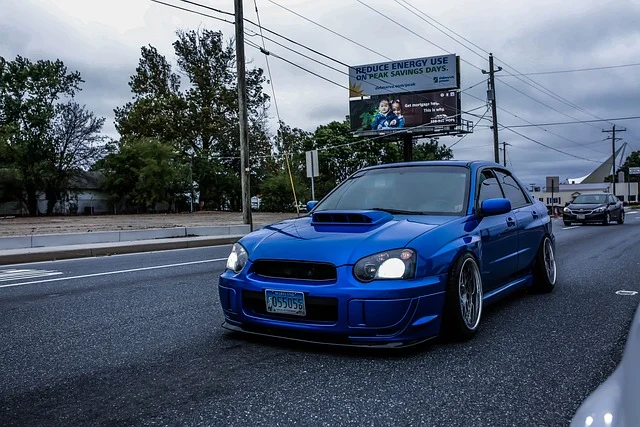 Blue Subaru on a street