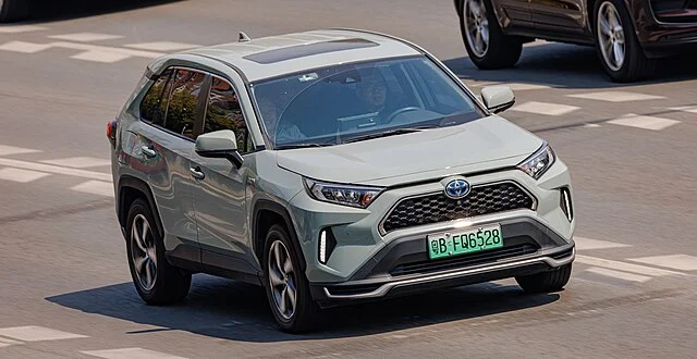 grey toyota rav4 prime on road