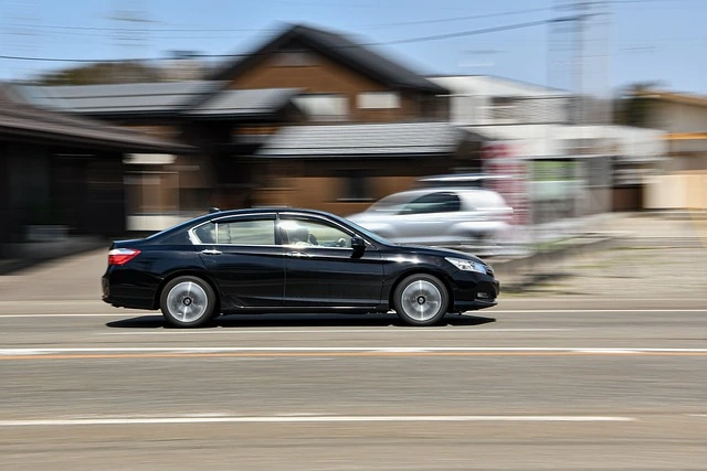 Honda Accord driving quickly