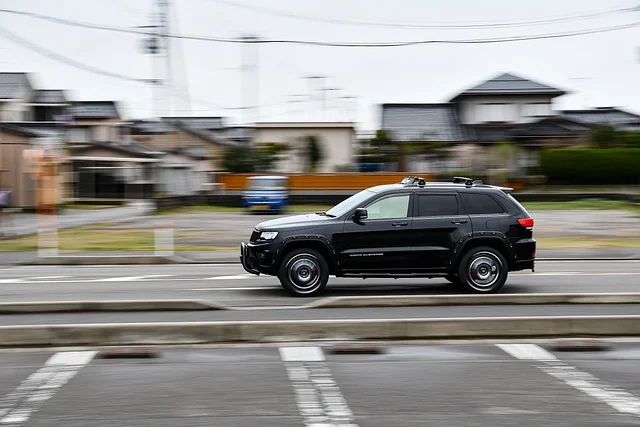 Jeep Grand Cherokee driving quickly