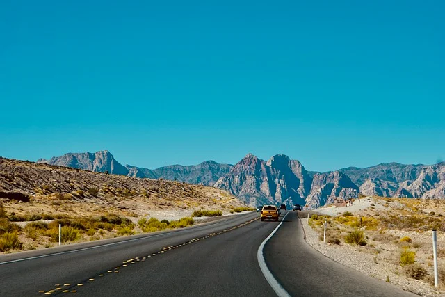 Car driving on a desert road